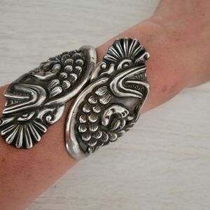 Stunning Pre-1940 Quetzalcoatl Repoussé Clamper Bracelet - Taxco
